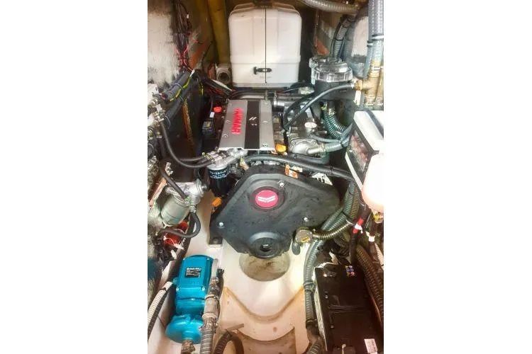  Yacht Photos Pics Engine room of a 2022 Bavaria C57 yacht, showcasing complex machinery and components.