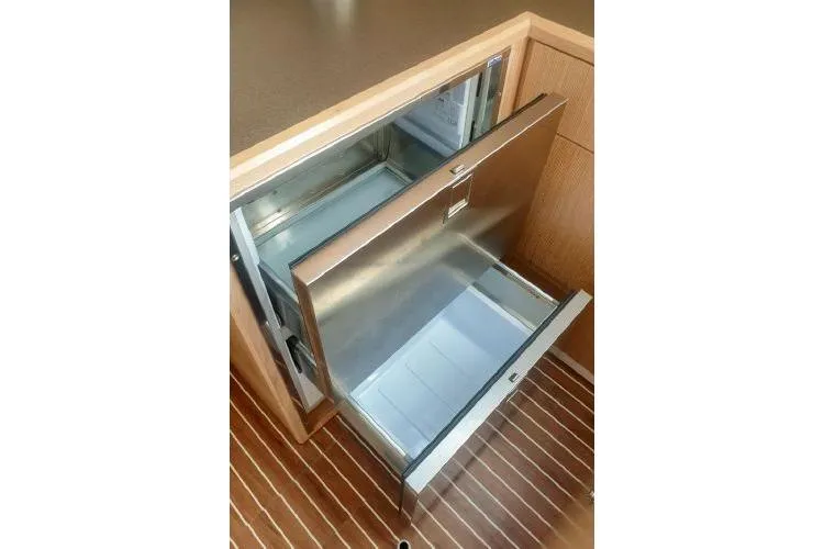  Yacht Photos Pics Stainless steel drawer fridge in Bavaria C57 yacht, 2022 model, with wooden flooring.