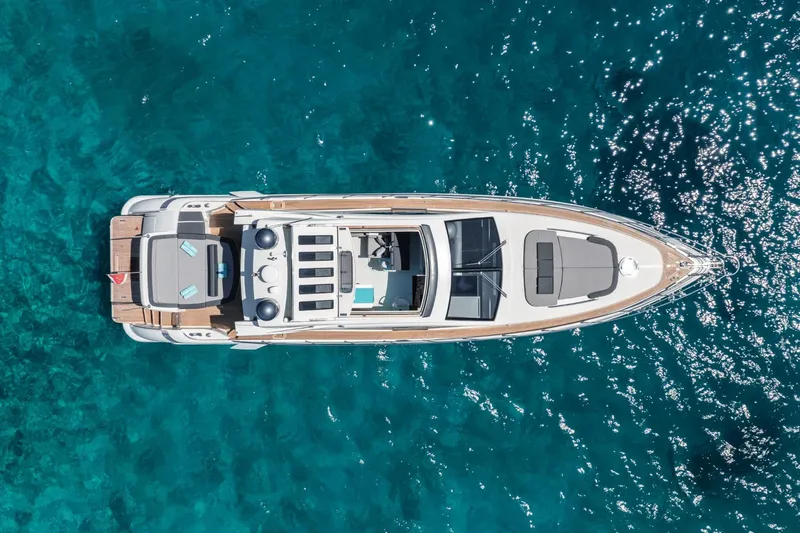  Yacht Photos Pics Aerial view of 2007 Azimut 68S yacht on clear blue water.