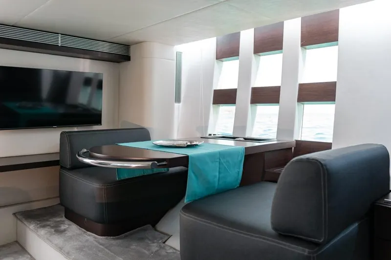  Yacht Photos Pics Luxurious interior of 2007 Azimut 68S yacht with modern seating and large windows.