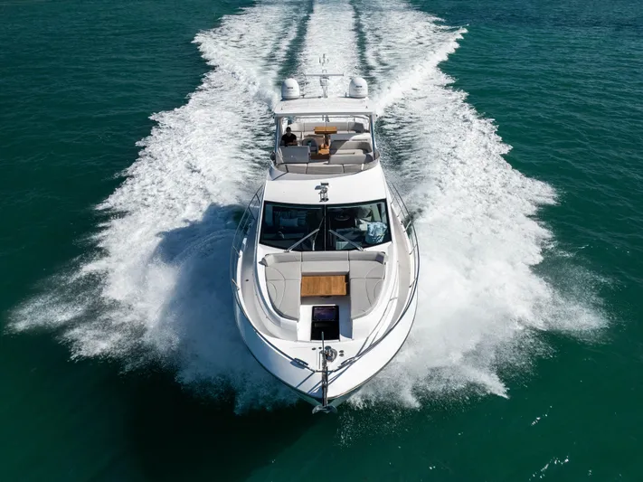 Dreams Yacht Photos Pics Sunseeker Manhattan 55 yacht cruising on open water, 2021 model.