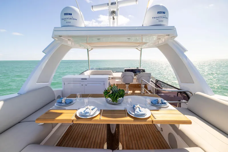 Dreams Yacht Photos Pics Luxurious Sunseeker Manhattan 55 yacht interior with elegant dining setup, 2021 model.