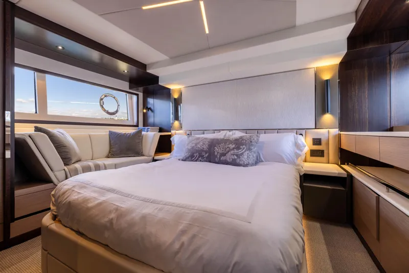 Dreams Yacht Photos Pics Luxurious bedroom interior of 2021 Sunseeker Manhattan 55 yacht, featuring elegant design and modern amenities.
