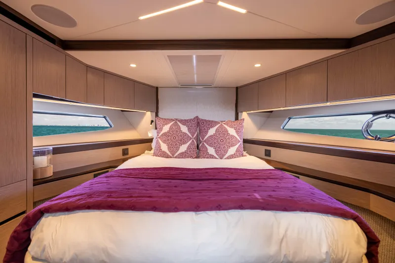 Dreams Yacht Photos Pics Luxurious bedroom interior of 2021 Sunseeker Manhattan 55 yacht with elegant bedding.