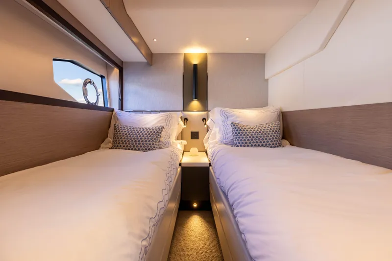 Dreams Yacht Photos Pics Luxurious twin cabin interior of 2021 Sunseeker Manhattan 55 yacht.