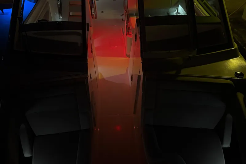  Yacht Photos Pics 2025 Boston Whaler 280 Vantage interior with ambient lighting, showcasing modern design.