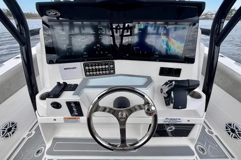  Yacht Photos Pics 2023 Sea Fox 328 Commander boat dashboard with advanced navigation displays and controls.