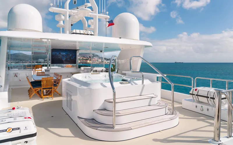 Sea Class Yacht Photos Pics Luxurious 1997 Christensen yacht deck with jacuzzi, ocean view, and seating area.