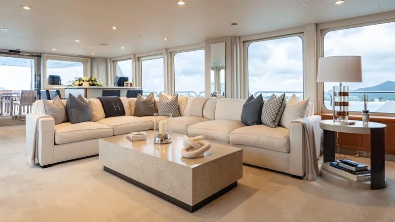 Sea Class Yacht Photos Pics Luxurious yacht interior with elegant seating, modern decor, and ocean views. Christensen 1997 model.