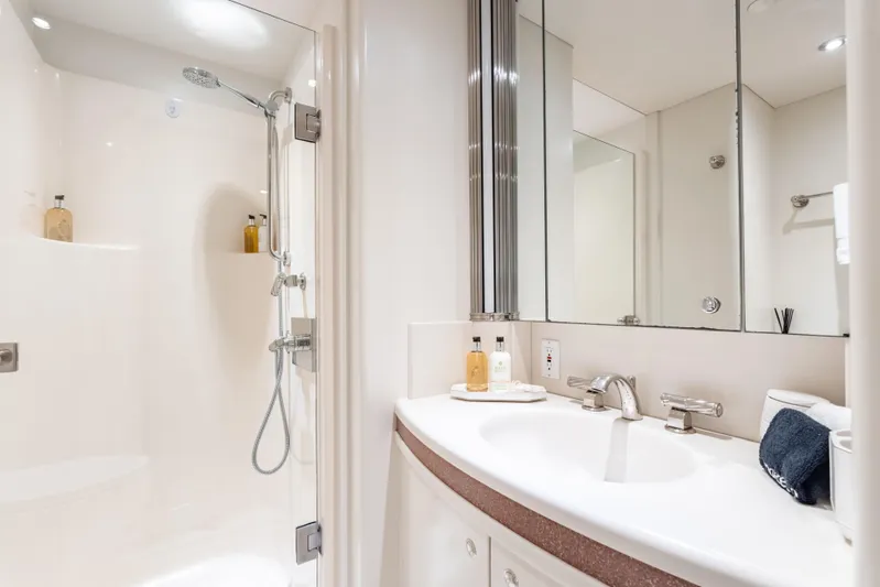 Sea Class Yacht Photos Pics Luxurious yacht bathroom with modern shower and sleek vanity, Christensen 1997 model.