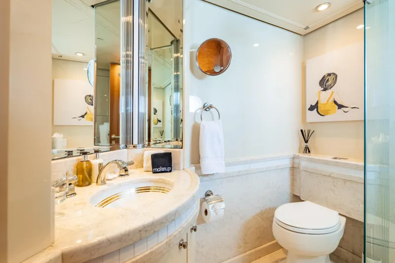 Sea Class Yacht Photos Pics Luxurious yacht bathroom with marble sink, modern decor, and elegant lighting, Christensen 1997 model.