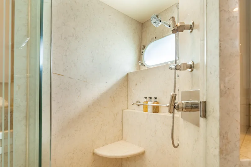 Sea Class Yacht Photos Pics Luxurious marble shower with modern fixtures in a 1997 Christensen model yacht.