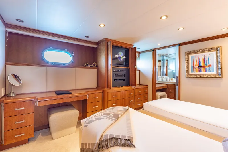 Sea Class Yacht Photos Pics Luxurious 1997 Christensen yacht cabin with twin beds, wooden decor, and elegant furnishings.