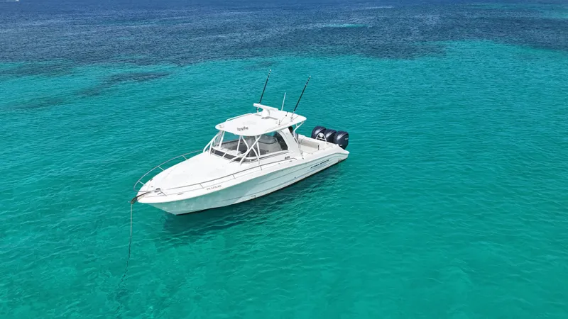  Yacht Photos Pics 2009 Hydra-Sports 3500 VX boat floating on clear turquoise water.