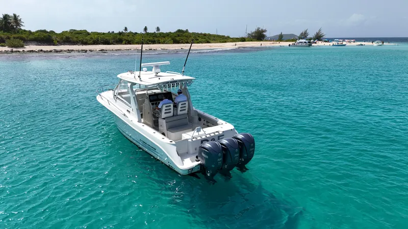  Yacht Photos Pics 2009 Hydra-Sports 3500 VX boat on turquoise water near a sandy beach.