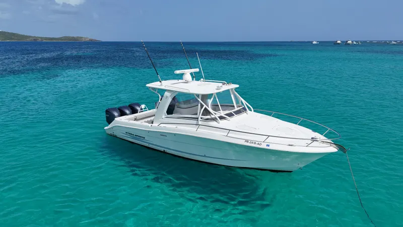  Yacht Photos Pics 2009 Hydra-Sports 3500 VX boat anchored in clear turquoise water.