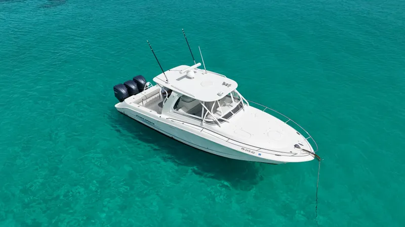  Yacht Photos Pics 2009 Hydra-Sports 3500 VX boat anchored in clear turquoise water.