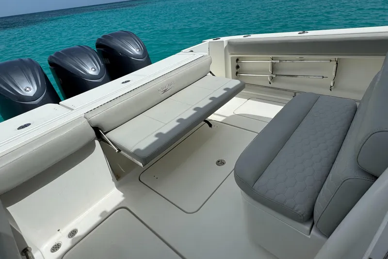  Yacht Photos Pics 2009 Hydra-Sports 3500 VX boat interior with seating and outboard motors on turquoise water.