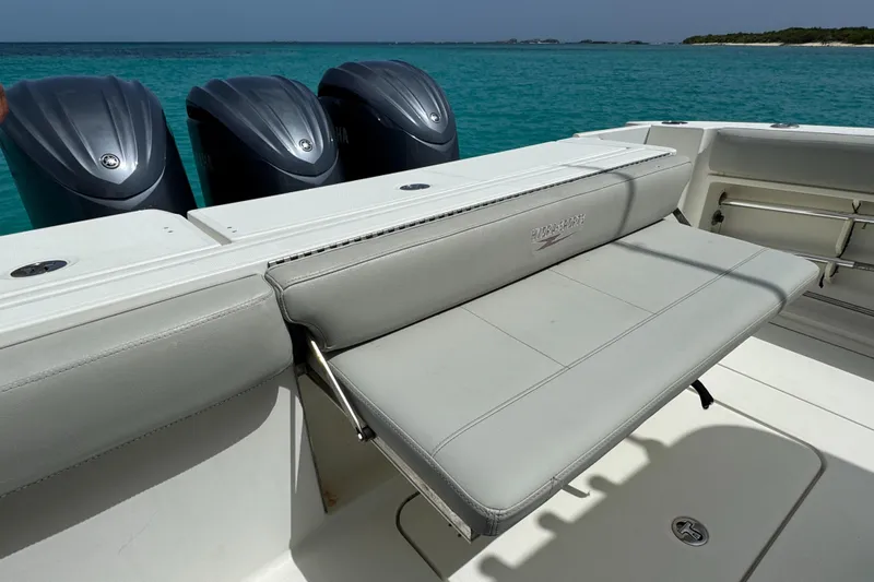  Yacht Photos Pics 2009 Hydra-Sports 3500 VX boat with foldable seat and triple outboard motors on turquoise water.