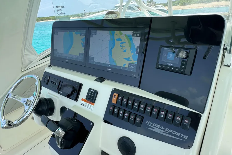  Yacht Photos Pics 2009 Hydra-Sports 3500 VX boat dashboard with navigation screens and controls.