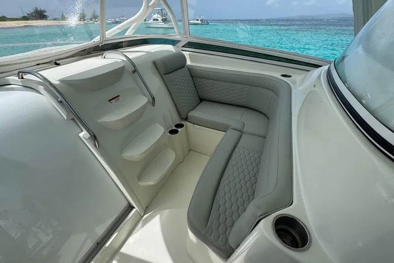  Yacht Photos Pics 2009 Hydra-Sports 3500 VX boat interior with cushioned seating and ocean view.