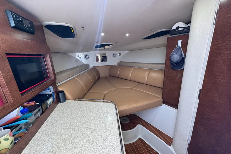  Yacht Photos Pics 2009 Hydra-Sports 3500 VX cabin interior with leather seating and modern amenities.