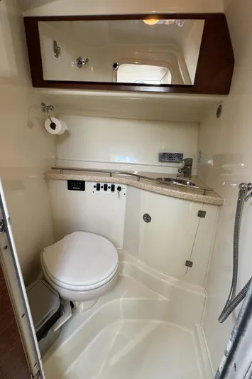  Yacht Photos Pics 2009 Hydra-Sports 3500 VX boat bathroom with toilet, sink, and mirror.