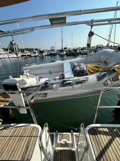 "orion" Yacht Photos Pics Hunter 45 Deck Salon 2012 yacht at marina with dinghy and equipment.