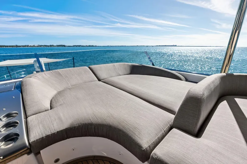 Yacht Photos Pics Luxurious sunbed on 2021 Azimut Fly 78 yacht overlooking serene ocean view.