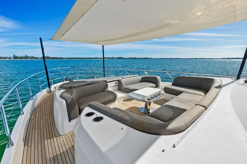  Yacht Photos Pics Luxurious 2021 Azimut Fly 78 yacht deck with elegant seating and ocean view.