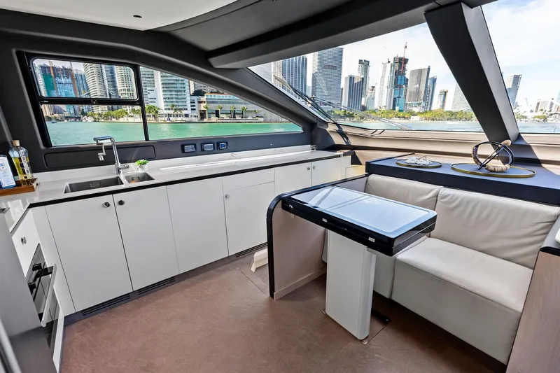  Yacht Photos Pics Luxurious interior of 2021 Azimut Fly 78 yacht with city skyline view.