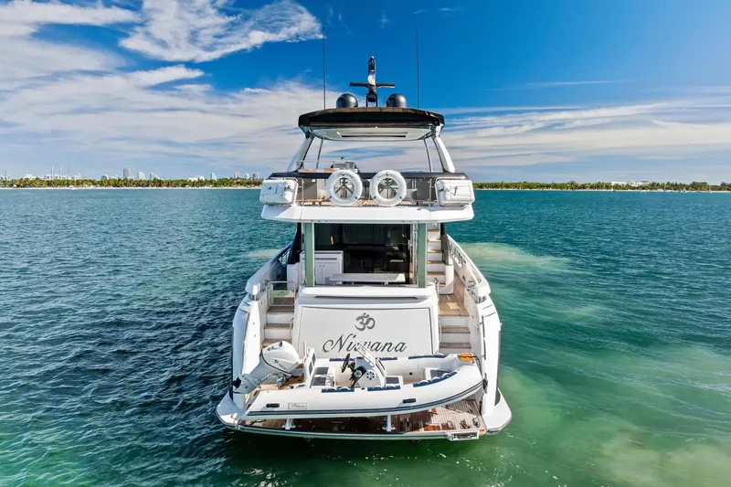  Yacht Photos Pics 2021 Azimut Fly 78 yacht on open water, rear view, clear sky.