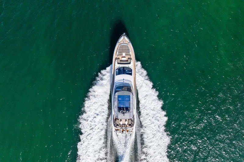  Yacht Photos Pics Aerial view of 2021 Azimut Fly 78 yacht cruising on open water.