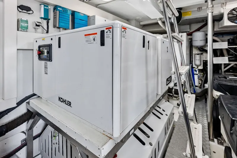  Yacht Photos Pics Engine room of 2021 Azimut Fly 78 yacht featuring Kohler generator.