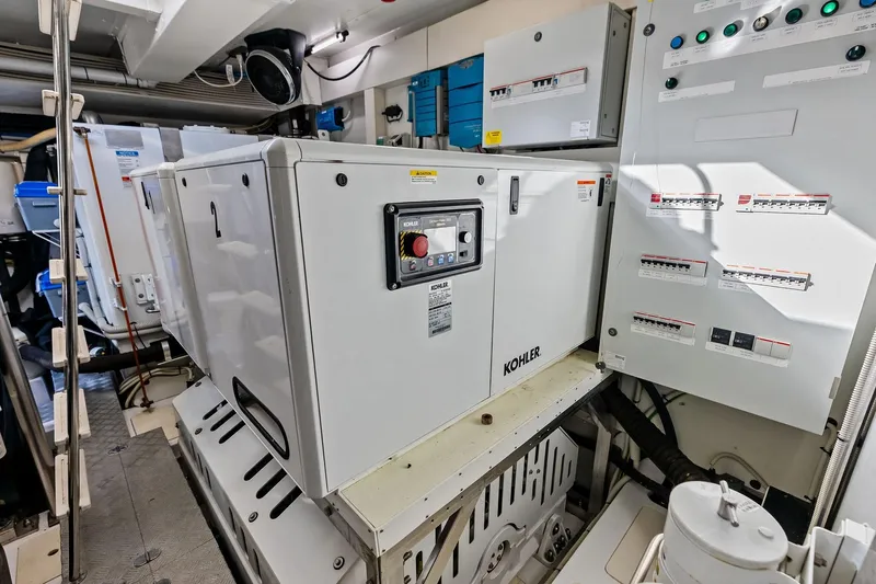 Yacht Photos Pics Engine room of 2021 Azimut Fly 78 yacht with Kohler generator and control panels.