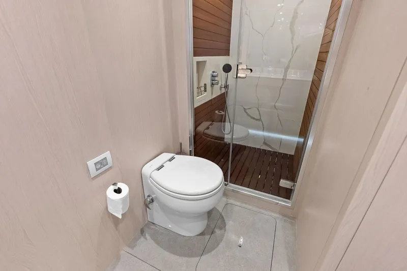  Yacht Photos Pics Luxurious bathroom in 2021 Azimut Fly 78 yacht with modern shower and toilet.