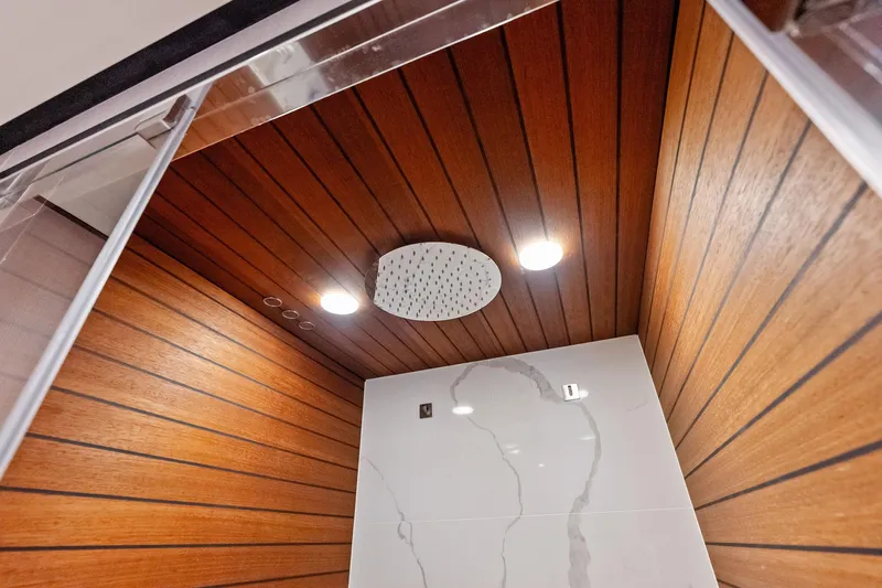  Yacht Photos Pics Luxurious wooden shower interior on 2021 Azimut Fly 78 yacht.