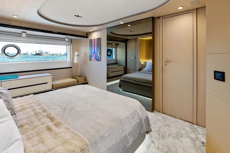  Yacht Photos Pics Luxurious interior of 2021 Azimut Fly 78 yacht bedroom with modern design and sea view.
