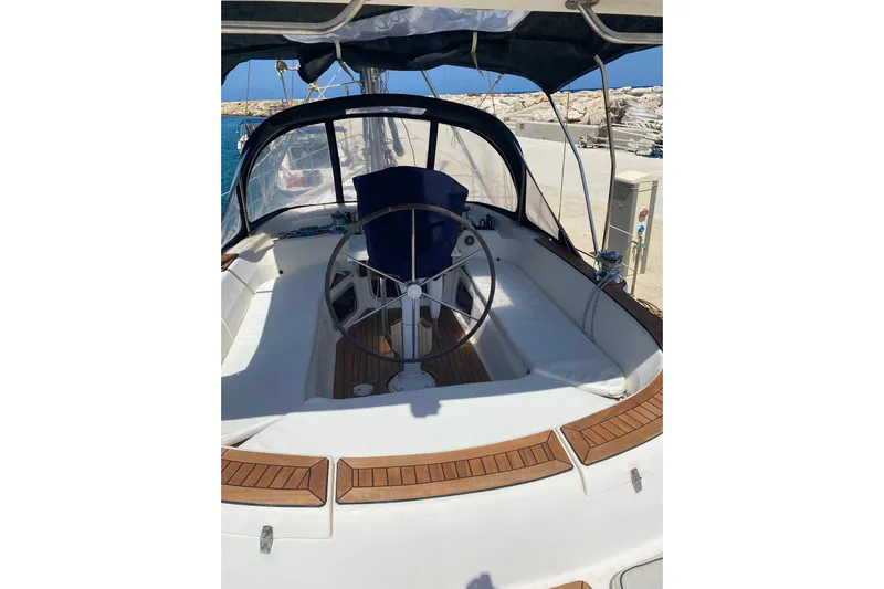  Yacht Photos Pics Hunter 45 Center Cockpit sailboat, 2000 model, featuring spacious helm and seating area.