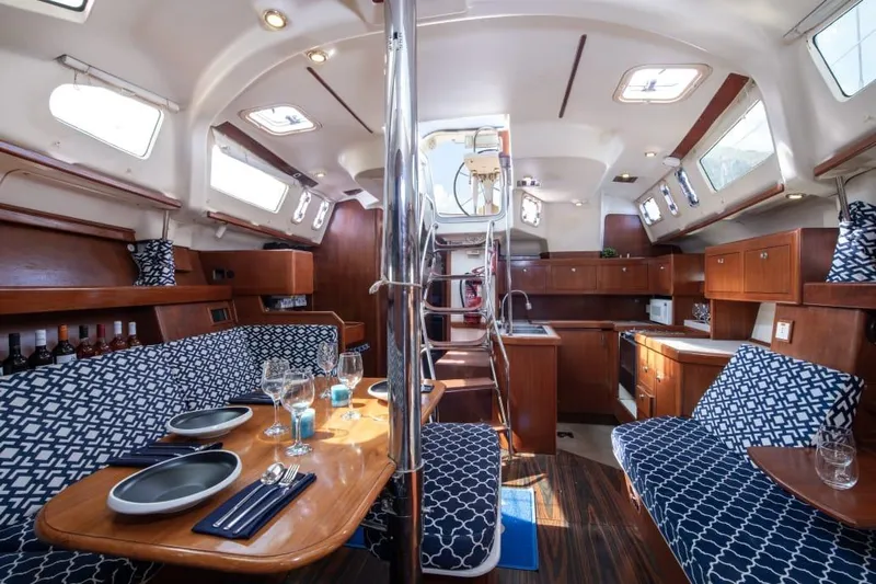  Yacht Photos Pics Interior of 2000 Hunter 45 Center Cockpit yacht with elegant dining and kitchen area.