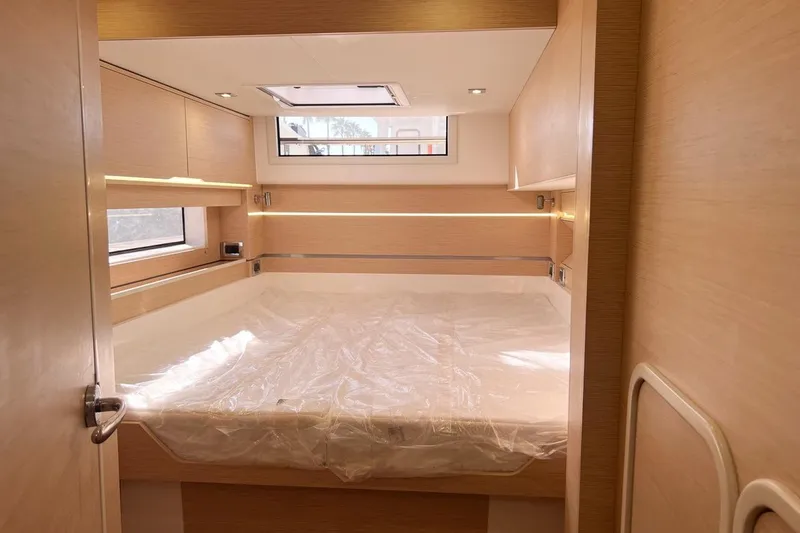 Just Wonder Yacht Photos Pics 2024 Cervetti 44 yacht interior cabin with modern design and natural lighting.