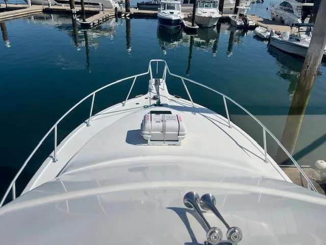 Catherine Ann Yacht Photos Pics Bow view of 1998 Ocean Yachts 40 Super Sport at marina.