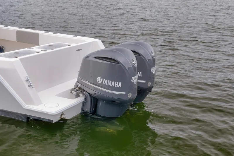  Yacht Photos Pics 2012 Contender 32 Tournament boat with twin Yamaha outboard motors on water.