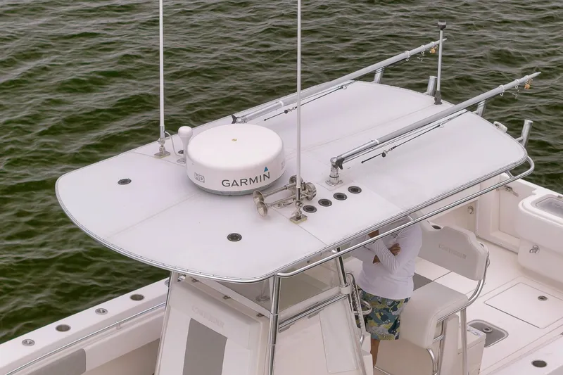  Yacht Photos Pics 2012 Contender 32 Tournament boat with Garmin radar on open water.