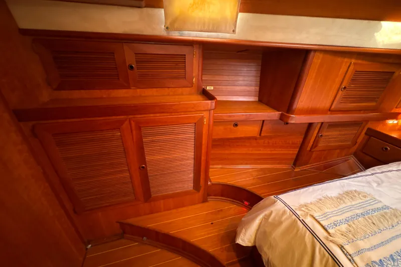 Ganymede Yacht Photos Pics Luxurious wooden interior of a 2001 North Wind 56 yacht cabin.