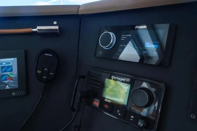  Yacht Photos Pics Control panel of 2023 Bali 4.4 yacht with navigation and audio systems.