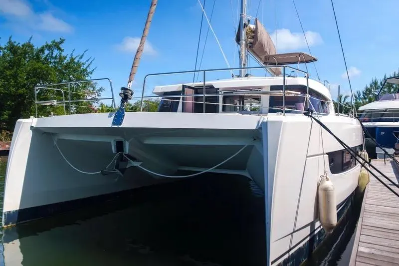  Yacht Photos Pics 2023 Bali 4.4 catamaran docked, featuring sleek design and modern amenities.