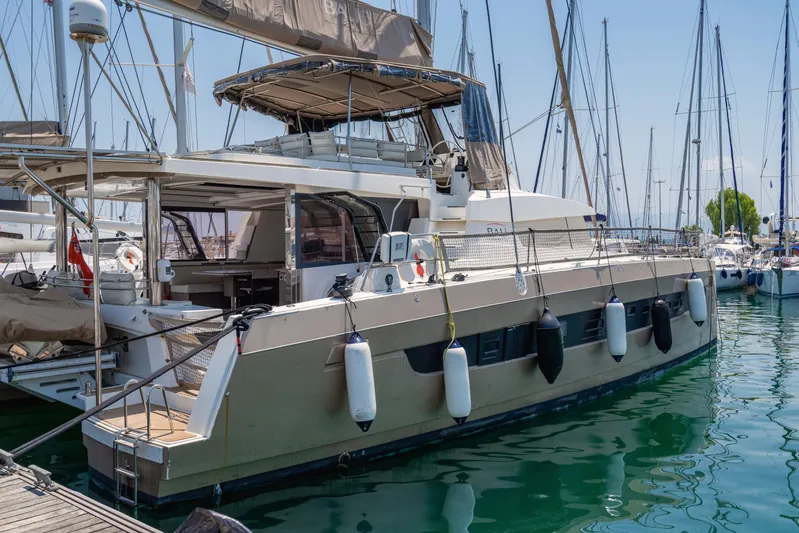Cinders Yacht Photos Pics 2020 Bali 5.4 yacht docked in marina, surrounded by other sailboats.