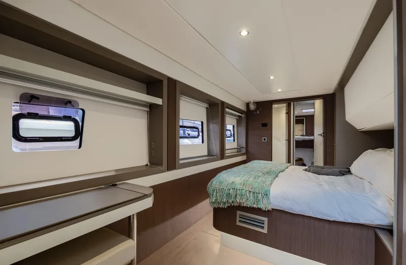 Cinders Yacht Photos Pics Luxurious interior of 2020 Bali 5.4 yacht cabin with cozy bed and modern design.