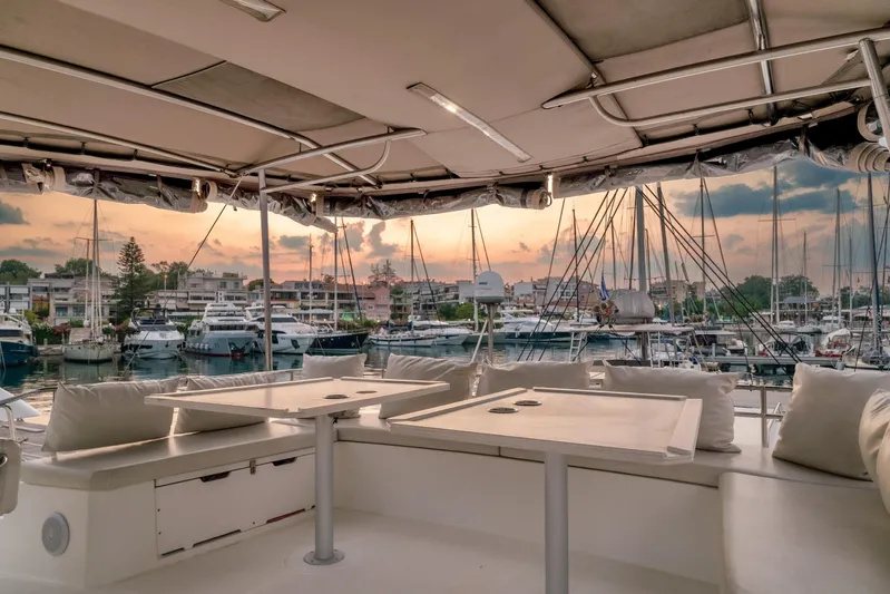 Cinders Yacht Photos Pics Luxurious Bali 5.4 yacht interior with marina view at sunset, 2020 model.